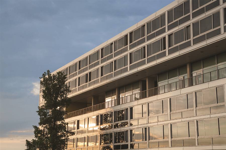 Vandenberg Hall — long glazed facade at sunset